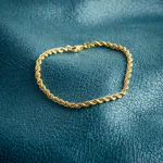 Armband als Kordelkette hohl in Gelbgold 333 / 8K, 18,5 cm lang, 3,3 mm breit, Gewicht ca. 2.8 g.