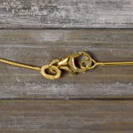 Goldkette als Tondakette in Gelbgold 375 / 9K, 70 cm lang, 0,8 mm breit, Gewicht ca. 4.4 g.