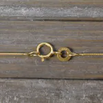 Goldkette als Schlangenkette in Gelbgold 333 / 8K, 40 cm lang, 0,8 mm breit, Gewicht ca. 1.7 g.