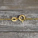 Goldkette als Figarokette diamantiert in Gelbgold 585 / 14K, 45 cm lang, 1,1 mm breit, Gewicht ca. 1.5 g.