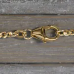 Goldkette als Panzerkette flach 1.1 Höhe in Gelbgold 750 / 18K, 80 cm lang, 2,4 mm breit, Gewicht ca. 18.1 g.