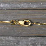 Goldkette als Schlangenkette diamantiert in Gelbgold 585 / 14K, 50 cm lang, 1 mm breit, Gewicht ca. 5.9 g.