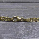 Armband als Zwillingspanzerkette in Gelbgold 333 / 8K, 21 cm lang, 3,9 mm breit, Gewicht ca. 2 g.