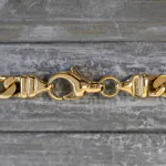 Goldkette als Figarokette diamantiert in Gelbgold 750 / 18K, 65 cm lang, 4,3 mm breit, Gewicht ca. 33.9 g.