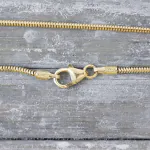 Goldkette als Schlangenkette in Gelbgold 585 / 14K, 55 cm lang, 1,4 mm breit, Gewicht ca. 5.3 g.