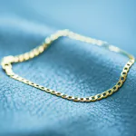 Armband als Panzerkette facettiert in Gelbgold 333 / 8 K, 18 cm lang, 5mm breit, Gewicht ca. 4.7 g.