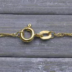 Goldkette als Singapurkette in Gelbgold 585 / 14K, 70 cm lang, 1,4 mm breit, Gewicht ca. 2.6 g.