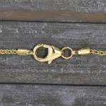 Goldkette als Zopfkette in Gelbgold 585 / 14K, 38 cm lang, 1,3 mm breit, Gewicht ca. 2.5 g.