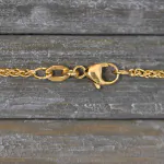 Goldkette als Zopfkette in Gelbgold 750 / 18K, 34 cm lang, 1,7 mm breit, Gewicht ca. 4.6 g.