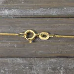 Goldkette als Schlangenkette in Gelbgold 585 / 14K, 60 cm lang, 0,9 mm breit, Gewicht ca. 4.7 g.