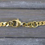 Goldkette als Panzerkette flach in Gelbgold 375 / 9K, 100 cm lang, 2,7 mm breit, Gewicht ca. 16.7 g.