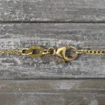 Goldkette als Figarokette diamantiert in Gelbgold 375 / 9 Karat, 38 cm lang, 1.5 mm breit, Gewicht ca. 1,9 g.