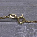 Goldkette als Figarokette diamantiert in Gelbgold 375 / 9K, 55 cm lang, 1,5 mm breit, Gewicht ca. 2.6 g.