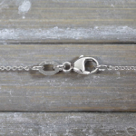 Goldkette als Ankerkette rund Weißgold 375 / 9K, 45 cm lang, 1,1 mm breit, Gewicht ca. 2 g.