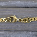 Goldkette als Panzerkette flach in Gelbgold 375 / 9K, 60 cm lang, 2,7 mm breit, Gewicht ca. 10 g.