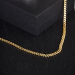 Armband als Panzerkette flach in Gelbgold 585 / 14K, 18,7 cm lang, 4,1 mm breit, Gewicht ca. 8 g.